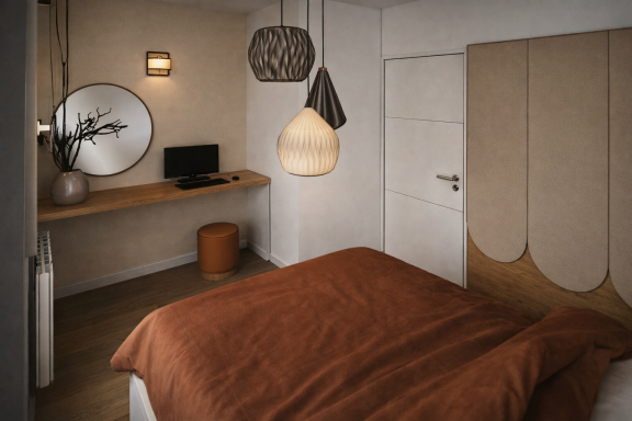 Chambre moderne avec un lit, bureau en bois et luminaires suspendus.